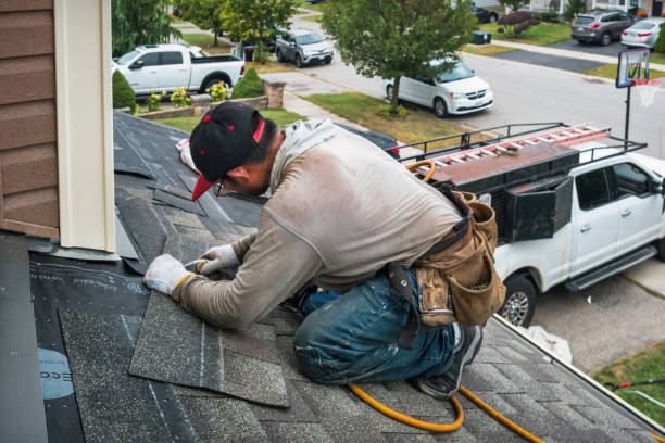 Professional Emergency Roof Repair technician working in Fairfield, IL